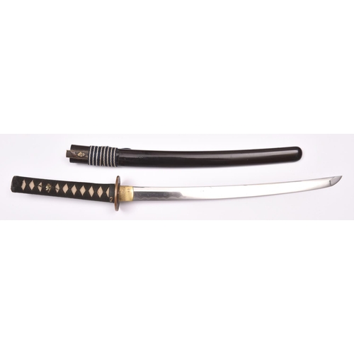 265 - A well mounted wakizashi, unsigned, one mekugi ana, 17th century, with irregular gunome hamon. 1 sma... 