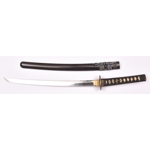 265 - A well mounted wakizashi, unsigned, one mekugi ana, 17th century, with irregular gunome hamon. 1 sma... 