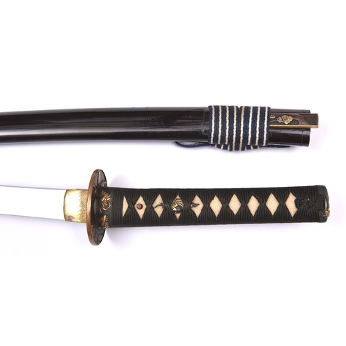 265 - A well mounted wakizashi, unsigned, one mekugi ana, 17th century, with irregular gunome hamon. 1 sma... 