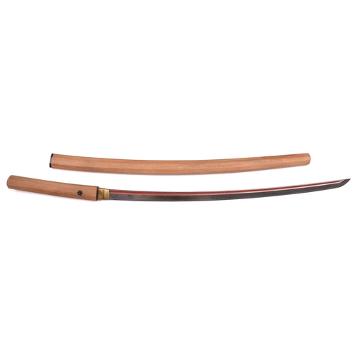 266 - A katana blade in shirasaya,  with full length grooves, red lacquered running down into the O-suriag... 