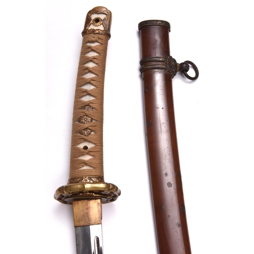 272 - A military katana in standard WWII mounts, grooved  blade, clip missing from fuchi. £600-800