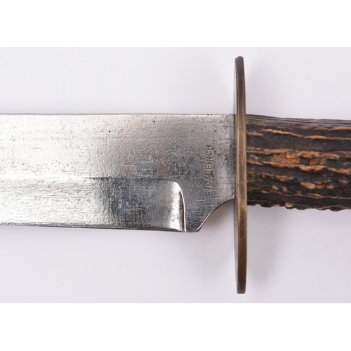 277 - A Bowie knife,  broad single edged blade 8¾” with short false edge, the ricasso stamped “H.M. FINCH”... 