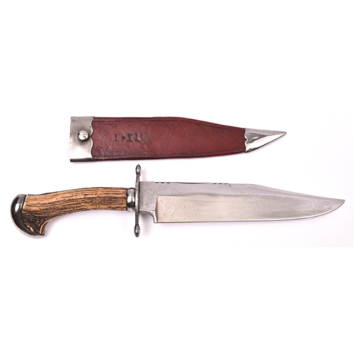 295 - A late Victorian Bowie knife, by G Wostenholm, the heavy clipped back blade 9½” marked “G. WOSTENHOL... 