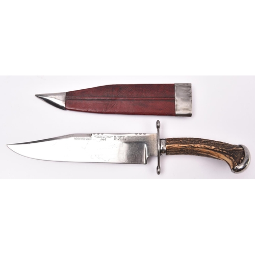 295 - A late Victorian Bowie knife, by G Wostenholm, the heavy clipped back blade 9½” marked “G. WOSTENHOL... 