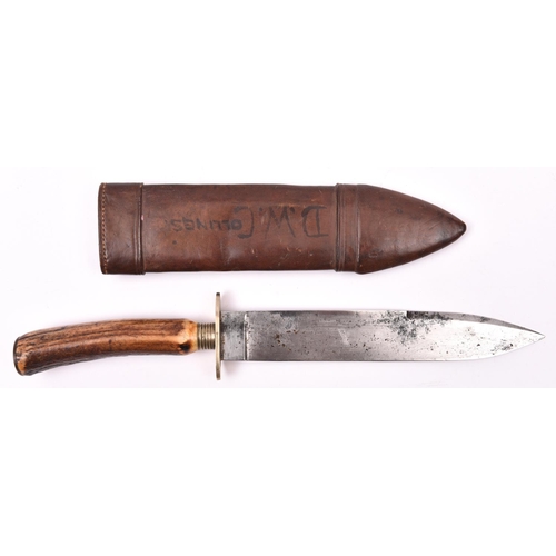 296 - A mid Victorian Bowie knife,  spear point blade 8” with false back edge, the ricasso marked “BAKER” ... 