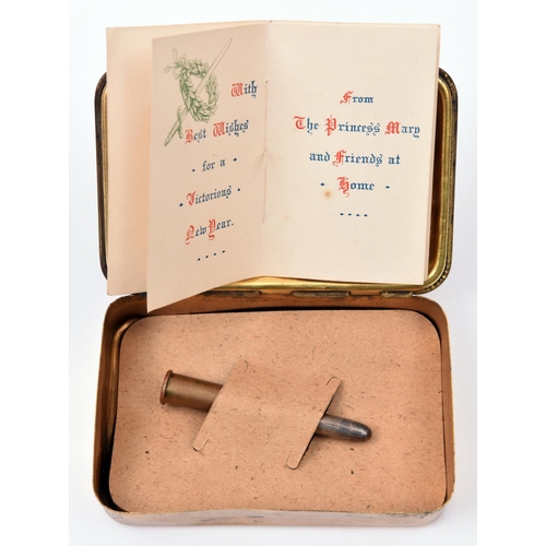 87 - A WWI Princess Mary’s Christmas gift tin,   containing Christmas greetings card message and bullet p... 