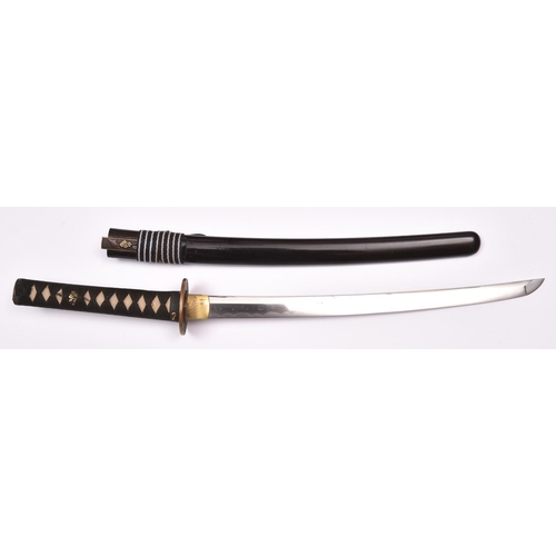 265 - A well mounted wakizashi, unsigned, one mekugi ana, 17th century, with irregular gunome hamon. 1 sma... 