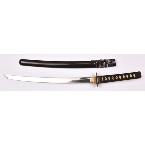 265 - A well mounted wakizashi, unsigned, one mekugi ana, 17th century, with irregular gunome hamon. 1 sma... 