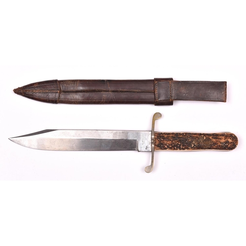 301 - An early 20th century Bowie knife,   heavy clipped back blade 9”, the ricasso marked “ED. WUSTHOT, S... 