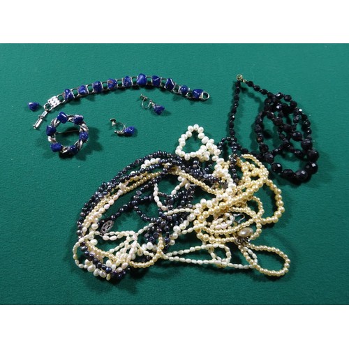 49 - A collection of costume jewellery, silver bangles, silver watch case, etc. 2x Mourning brooches. 8 c... 