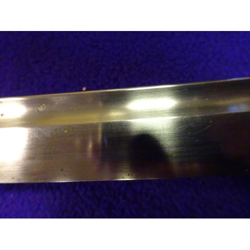 273 - A military katana  with full length grooves, blade appears to have some age with an O-suriage tang a... 