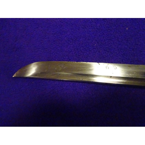 273 - A military katana  with full length grooves, blade appears to have some age with an O-suriage tang a... 