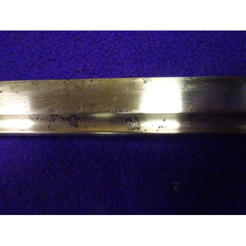 273 - A military katana  with full length grooves, blade appears to have some age with an O-suriage tang a... 