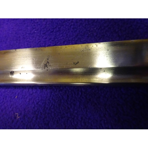 273 - A military katana  with full length grooves, blade appears to have some age with an O-suriage tang a... 