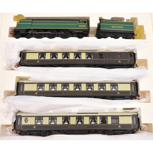 17 - A Hornby Train Pack. 'The Bournemouth Belle' (R.2661). Comprising an unnamed Battle of Britain class... 