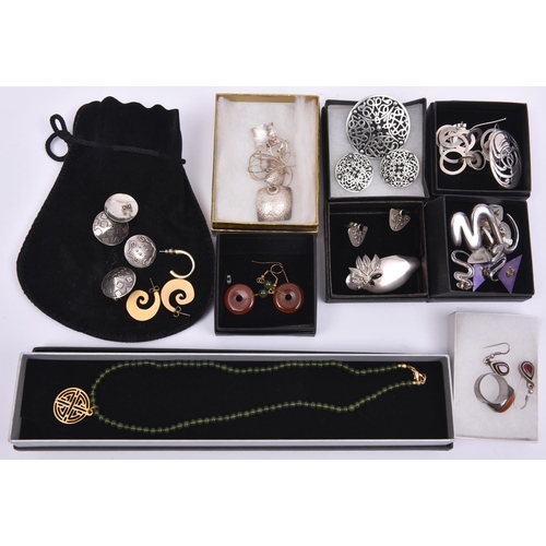 41 - 12x boxed items of jewelry, including several silver items. Mostly pairs of earrings with historical... 