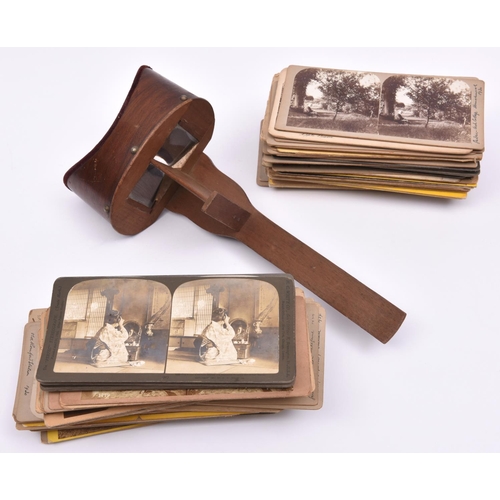 6 - A Stereoscopic Viewer and quantity of cards. Ebonised viewer with stereo and mono lenses, engraved '... 