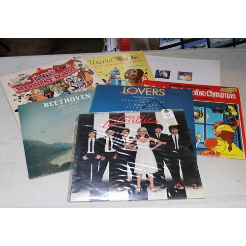 11 - 70+ LP vinyl records and 40+ 7 inch singles. Including; Supertramp, Paris. Judge Dread, Dreadmania. ... 