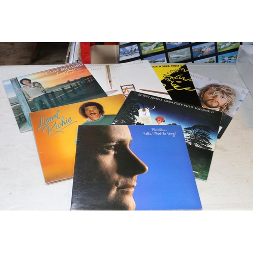 11 - 70+ LP vinyl records and 40+ 7 inch singles. Including; Supertramp, Paris. Judge Dread, Dreadmania. ... 