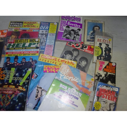 60 - A quantity of Rock music memorabilia, mostly Beatles related. Including vintage publications, articl... 