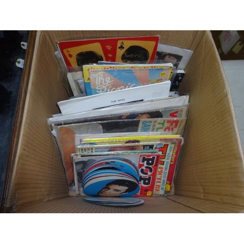 60 - A quantity of Rock music memorabilia, mostly Beatles related. Including vintage publications, articl... 