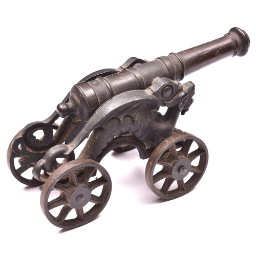 22 - A decorative iron cannon, barrel 15