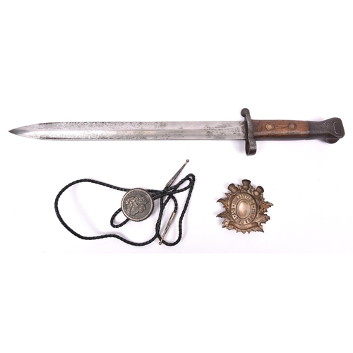 225 - A commercial type P1888 bayonet, devoid of any markings, GC, the blade clean (the hilt lightly pitte... 