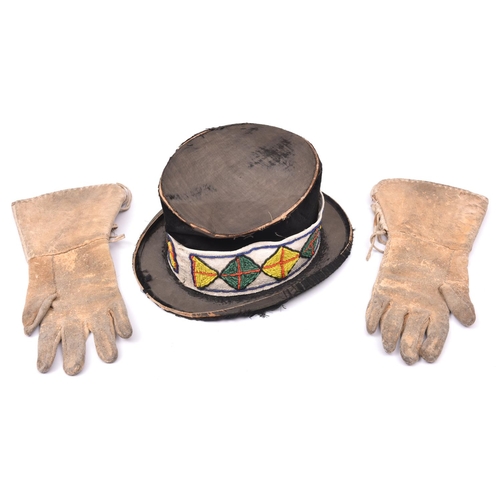 38 - A pair of native American Indian gloves and a hat from Buffalo Bill's Wild West Show, c 1904, the gl... 