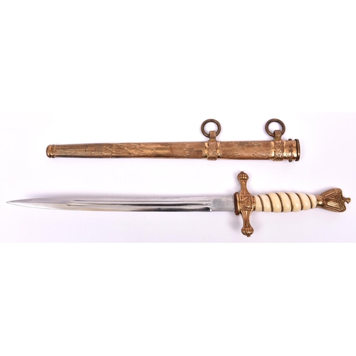 86 - A Third Reich Naval officer's dagger, with plain unmarked blade, in its sheath. GC, retaining much o... 