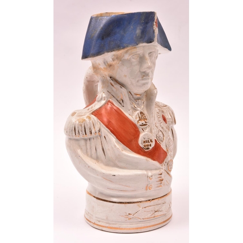 24 - An old glazed earthenware “character” jug in the form of Admiral Nelson, wearing medals and decorati... 