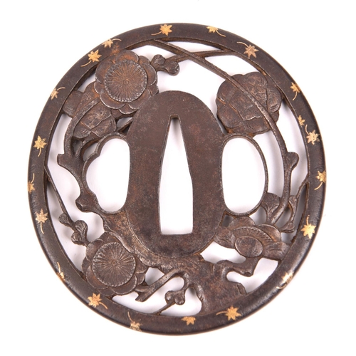 282 - A Bushu School tsuba, 73mm x 67mm, depicting plum blossom and gold foliage around the mimi (rim)   £... 