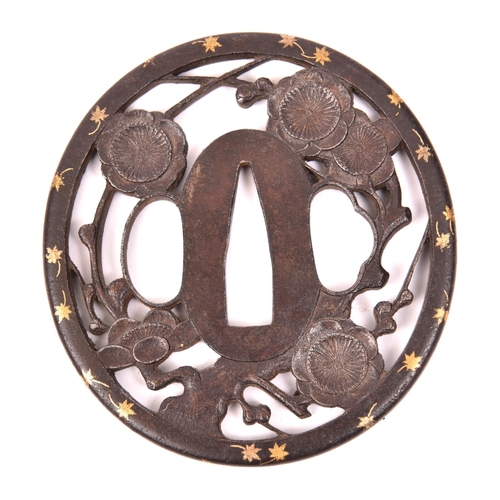 282 - A Bushu School tsuba, 73mm x 67mm, depicting plum blossom and gold foliage around the mimi (rim)   £... 