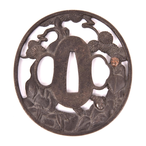 283 - A Soten style tsuba, showing 2 figures amid foliage. GC £200-300