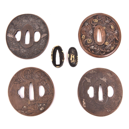 286 - 4 large modern tsuba and 1 modern fuchi kashira. £100-150