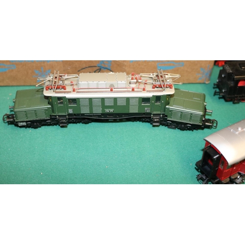 30 - A quantity of Marklin HO model railway. 4 locomotives- 2x German Railways, a class 03 4-6-2 tender l... 