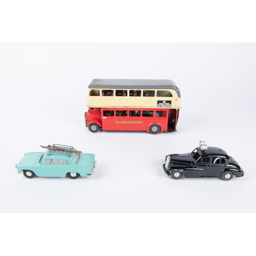 219 - 3x vehicles by various makes. A Tri-ang Spot-On Austin A60 Cambridge (184), in mint green with roofr... 