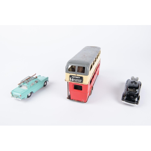 219 - 3x vehicles by various makes. A Tri-ang Spot-On Austin A60 Cambridge (184), in mint green with roofr... 