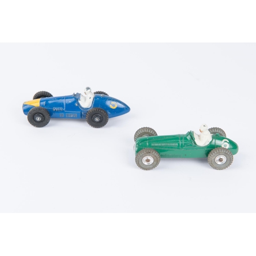 343 - 2 scarce Dinky Toys Racing Cars. A Ferrari (234) in blue with yellow triangle to nose and black cast... 