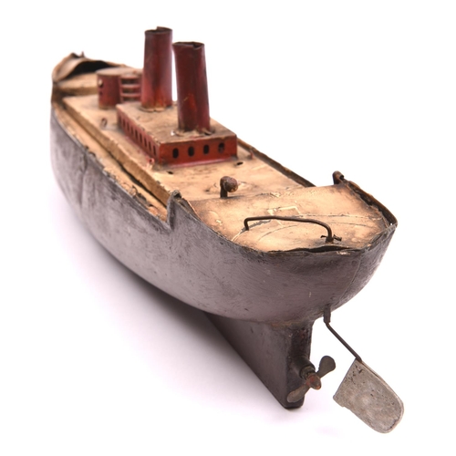 246 - A rare Bing L'Antonio tinplate clockwork powered Warship. Approximately 52cm in length, height to to... 