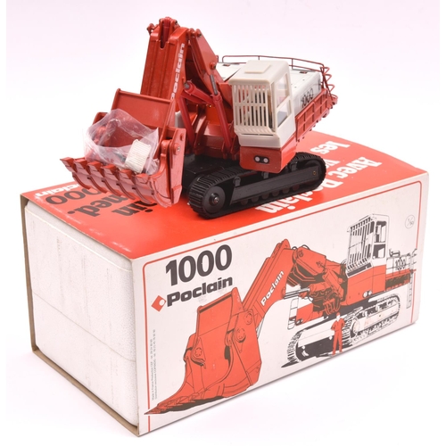 264 - 1000 Poclain Face Shovel 1:50 scale. Finished in red and grey livery. Boxed, with packing. Shovel GC... 