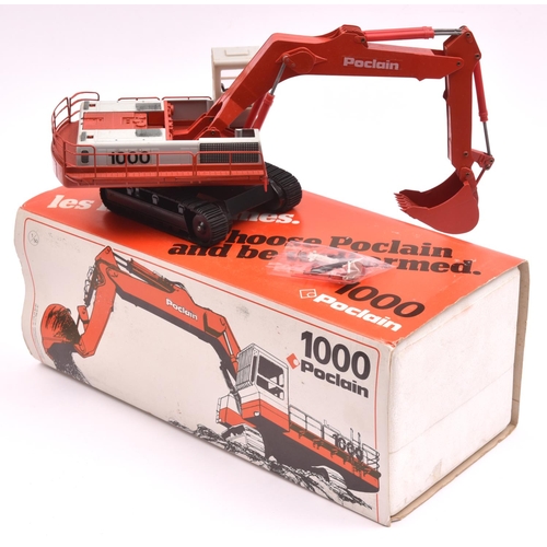 265 - 1000 Poclain Digging Shovel 1:50 scale. Finished in red and grey livery. Boxed, with packing. Shovel... 