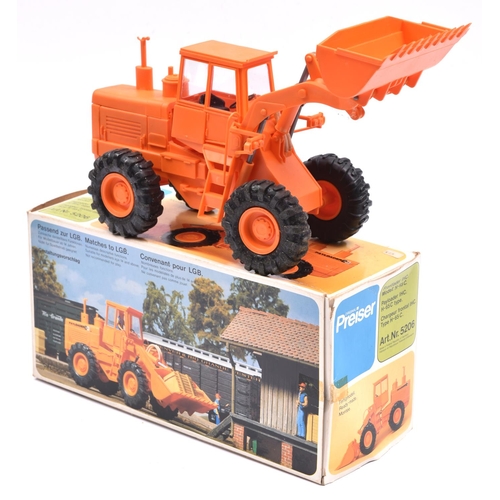 266 - An original rare Preiser Front Loader H-65C (Art No:5206). Scale 1:24. Finished in orange plastic wi... 