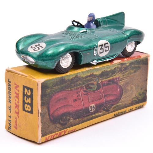 327 - A rare Nicky Toys (ex Dinky casting) Jaguar 'D' Type (238). An example in deep metallic green, RN35,... 