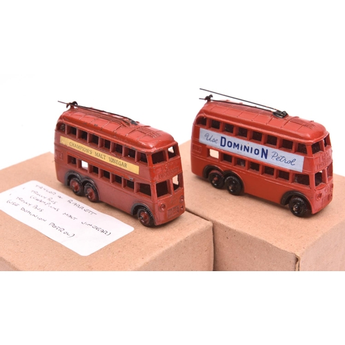 378 - A scarce Taylor & Barrett  small size trolley bus hollow cast ,finished in red with black metal whee... 