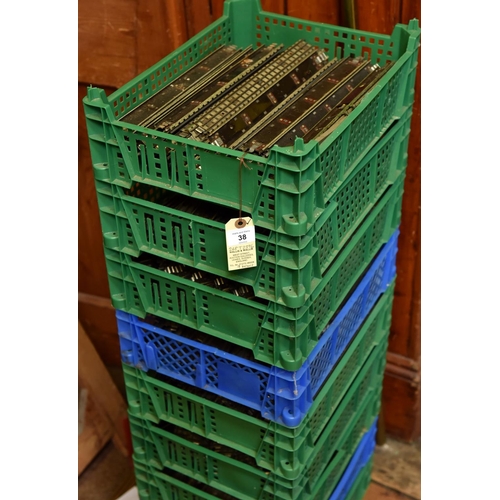 38 - Hornby Dublo 3-rail track sections. 9x plastic fruit/mushroom boxes containing a large quantity of 3... 