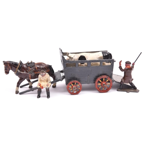 391 - 2 Johillco. A Cattle Cart in dark grey with red wheels, together with a brown heavy horse and a 'sho... 