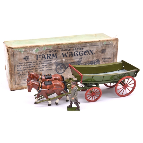 392 - A Britains Spudded Wheeled Fordson Major Tractor (127F). In dark blue with orange metal wheels. Comp... 