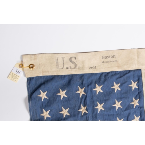 148 - A US flag, bearing 48 stars, 60