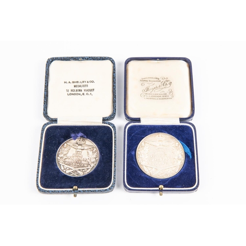 176 - An RAF Small Arms Association silver medallion, in its fitted case of issue, HM date 1938, 44mm diam... 