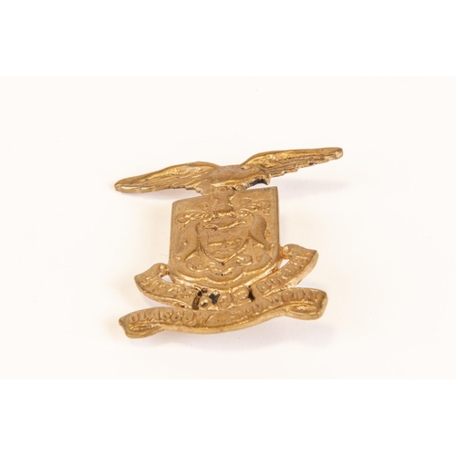 179 - A scarce die struck brass badge of the City of Edinburgh Bomber Squadron; a similar badge of cast br... 